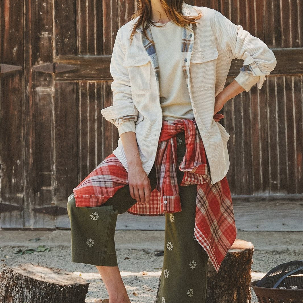Cream corduroy shacket layered over a neutral top