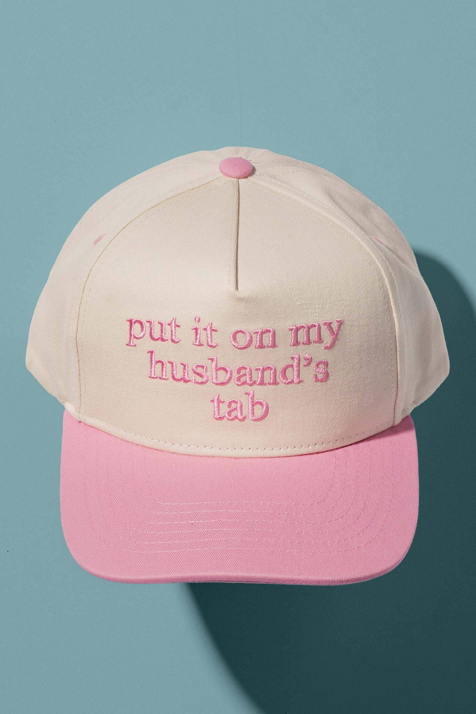 Put It On My Husbands Tab Trucker Hat