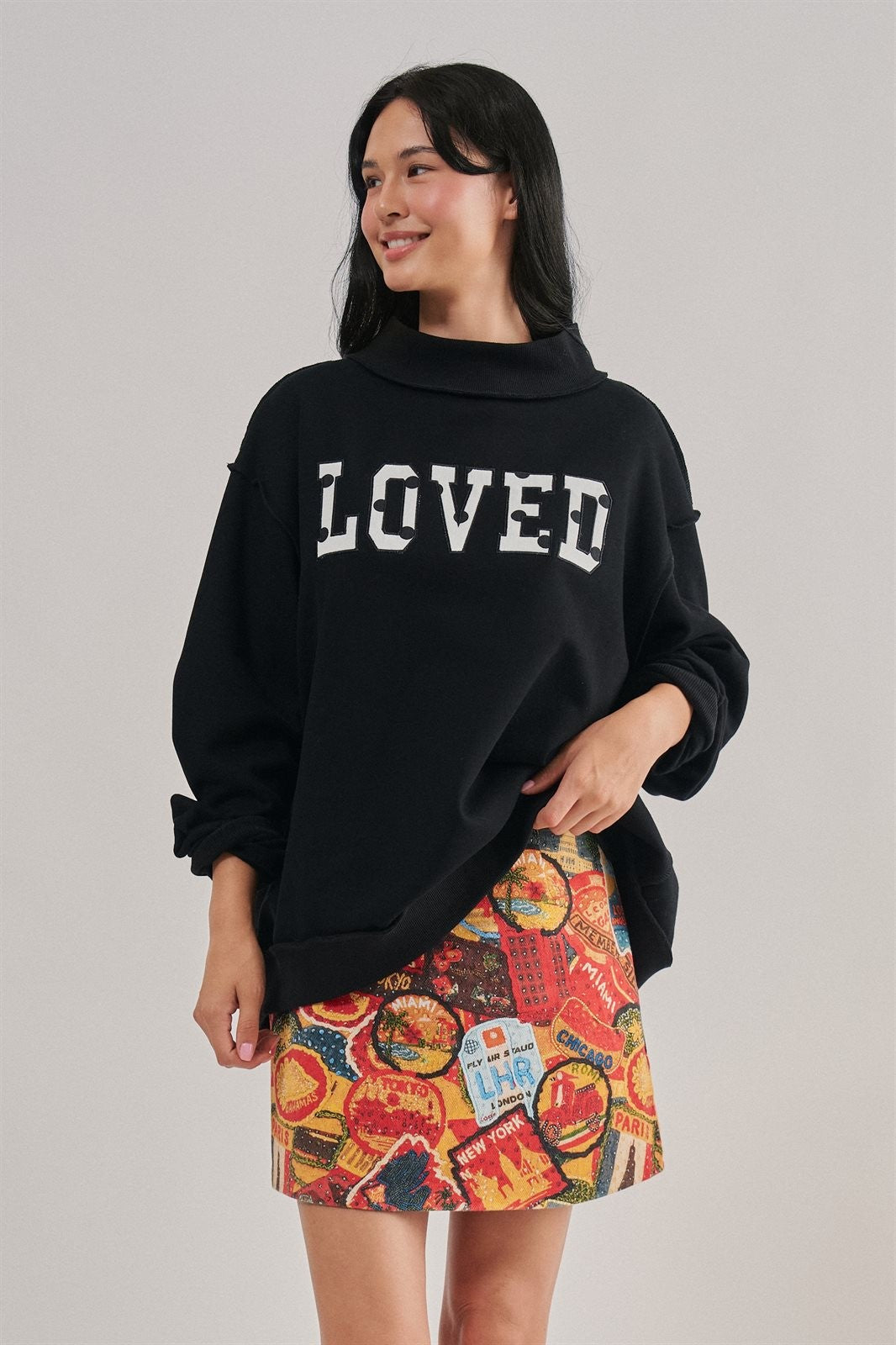 LOVED Varsity Patch Mock Neck Sweatshirt with Exposed Seams in BLACK - Women's Sweatshirts & Hoodies | Urban Daizy