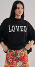 LOVED Varsity Patch Mock Neck Sweatshirt with Exposed Seams in BLACK - Women's Sweatshirts & Hoodies | Urban Daizy