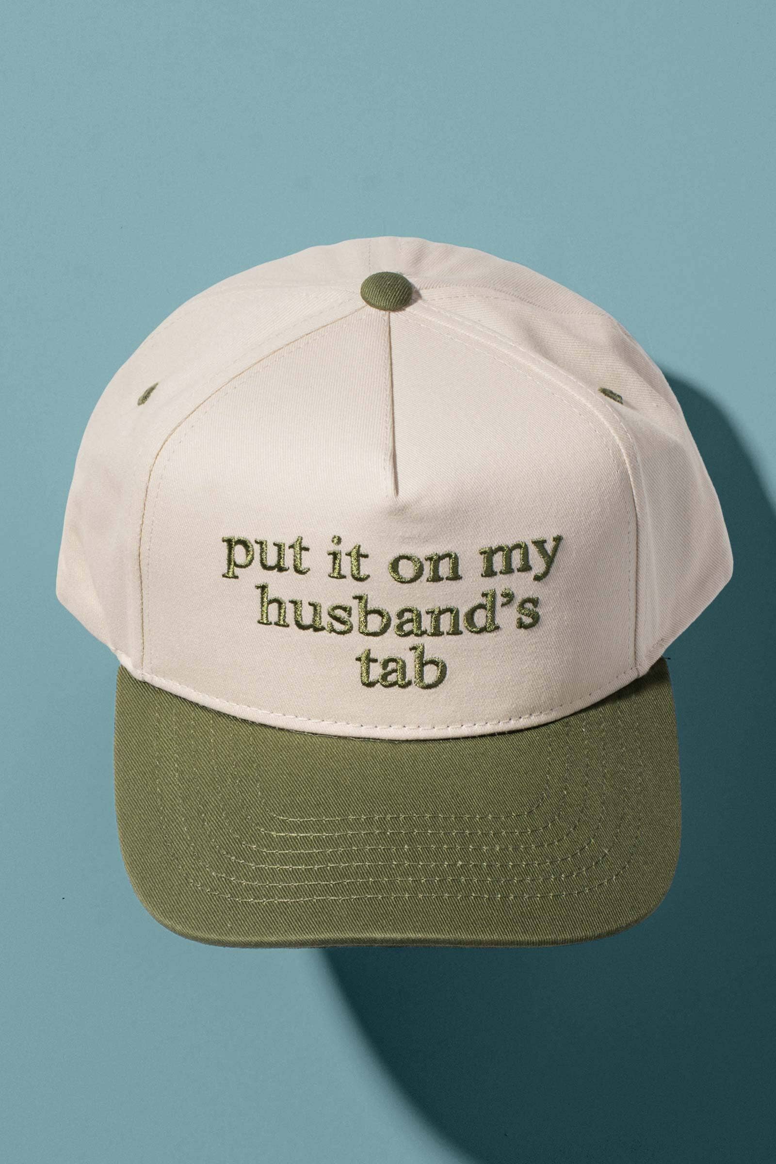 Put It On My Husbands Tab Trucker Hat