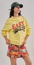 Easy Tiger Graphic Mock Neck Sweatshirt Brushed French Terry in YELLOW - Women's Sweatshirts & Hoodies | Urban Daizy