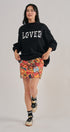 LOVED Varsity Patch Mock Neck Sweatshirt with Exposed Seams in BLACK - Women's Sweatshirts & Hoodies | Urban Daizy