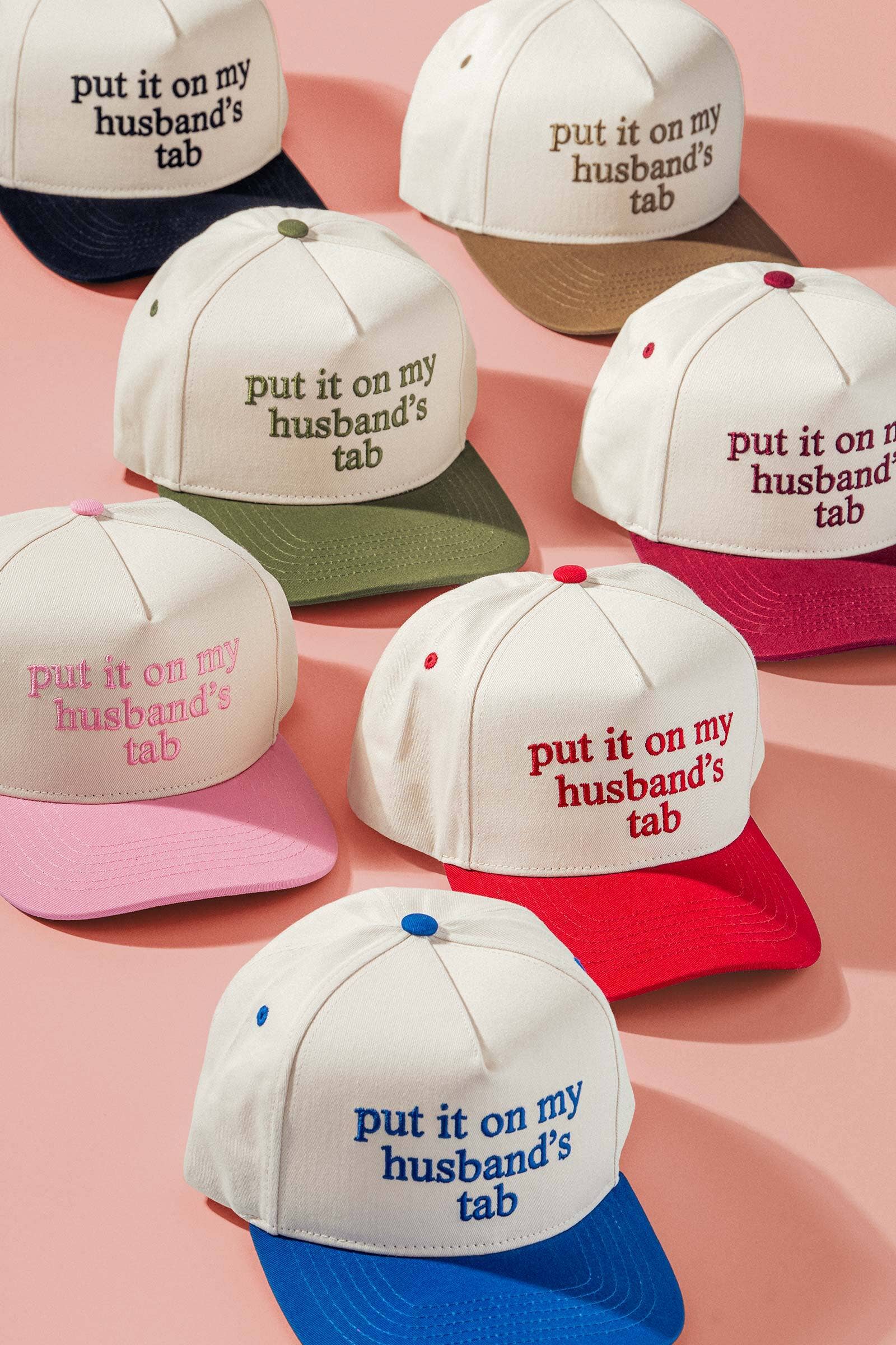 Put It On My Husbands Tab Trucker Hat