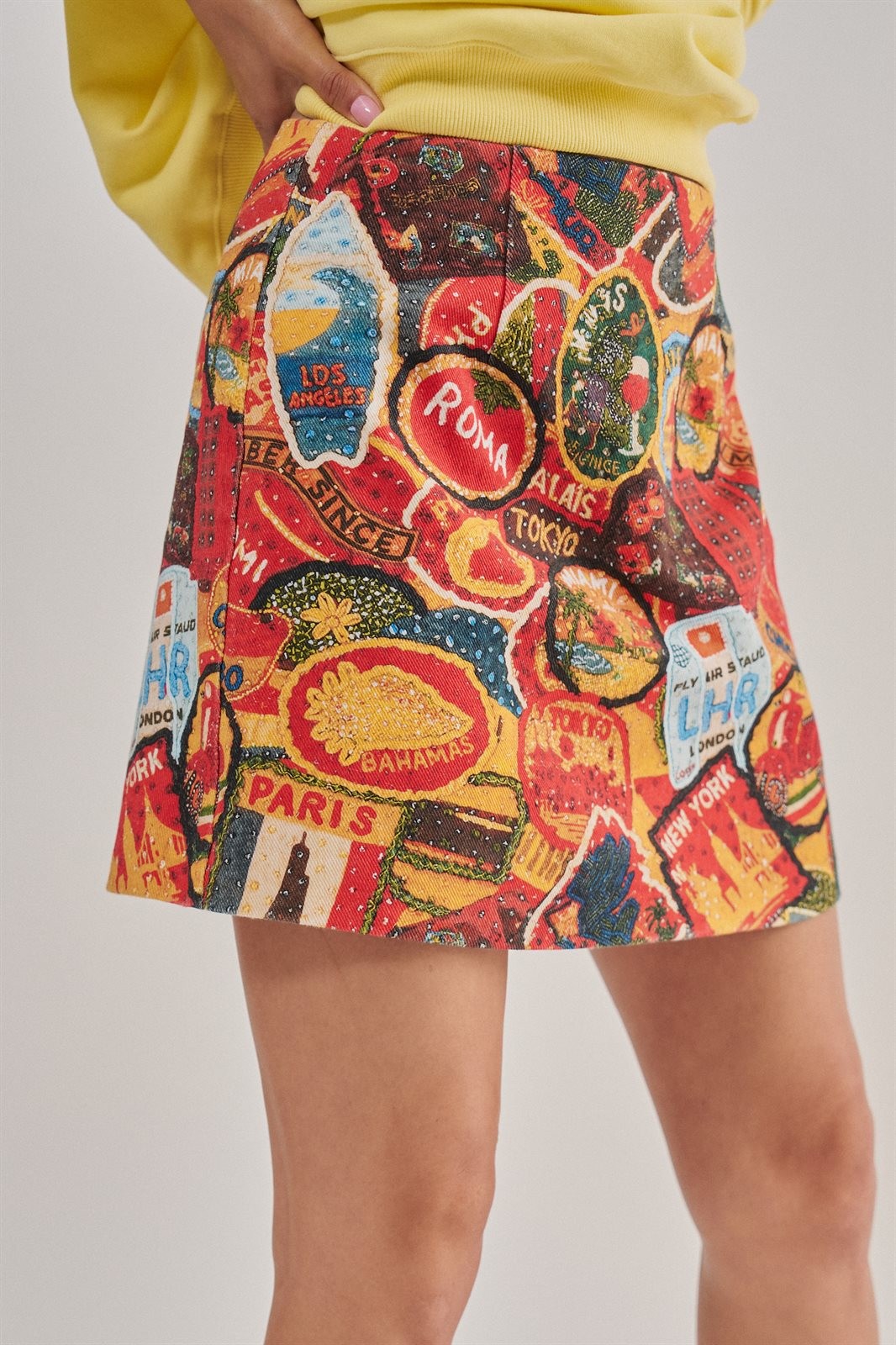Travel Patch Print Mini Skirt in Italian Summer Vacation in MULTI - Women's Mini Skirts | Urban Daizy