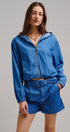 Chambray Cropped Hoodie Jacket with Drawstring Hem in Blue - Women's Jackets & Outerwear | Urban Daizy
