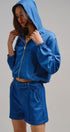 Chambray Cropped Hoodie Jacket with Drawstring Hem in Blue - Women's Jackets & Outerwear | Urban Daizy