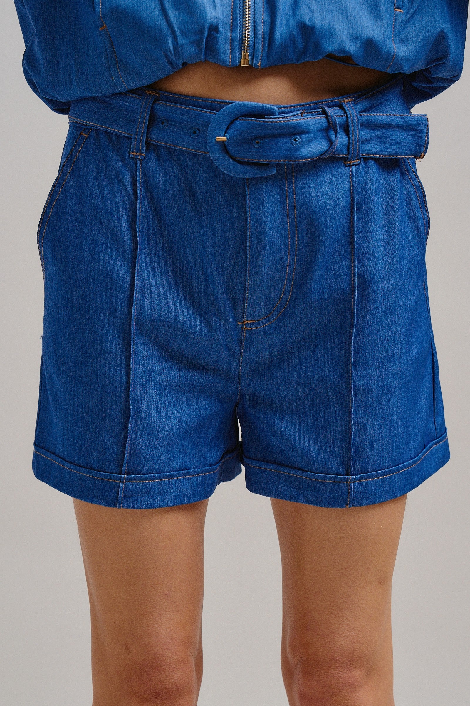High Waisted Chambray Belted Shorts With Cuffed Hem in Blue - Women's Pants | Urban Daizy