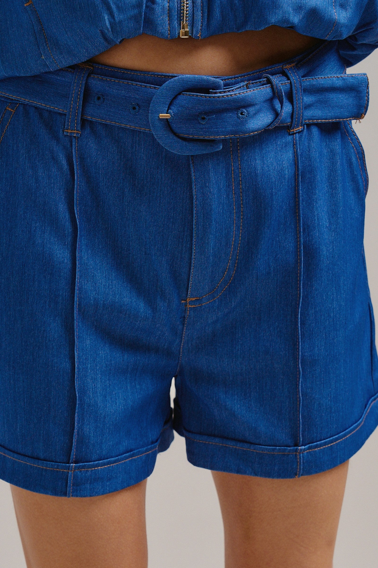 High Waisted Chambray Belted Shorts With Cuffed Hem in Blue - Women's Pants | Urban Daizy