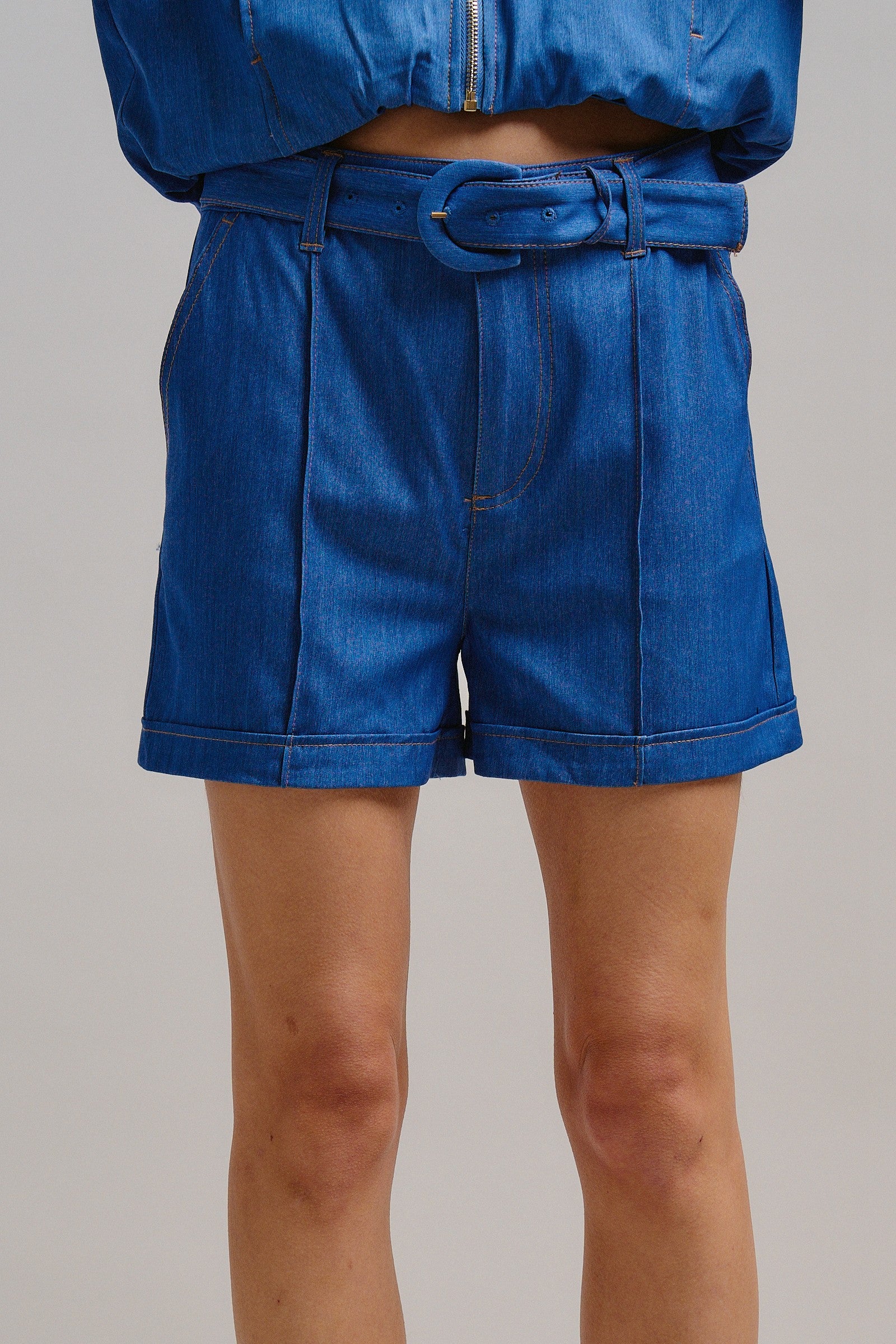 High Waisted Chambray Belted Shorts With Cuffed Hem in Blue - Women's Pants | Urban Daizy
