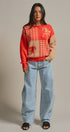 Houndstooth Horse Colorblock Knit Sweater in Orange - Women's Sweaters | Urban Daizy