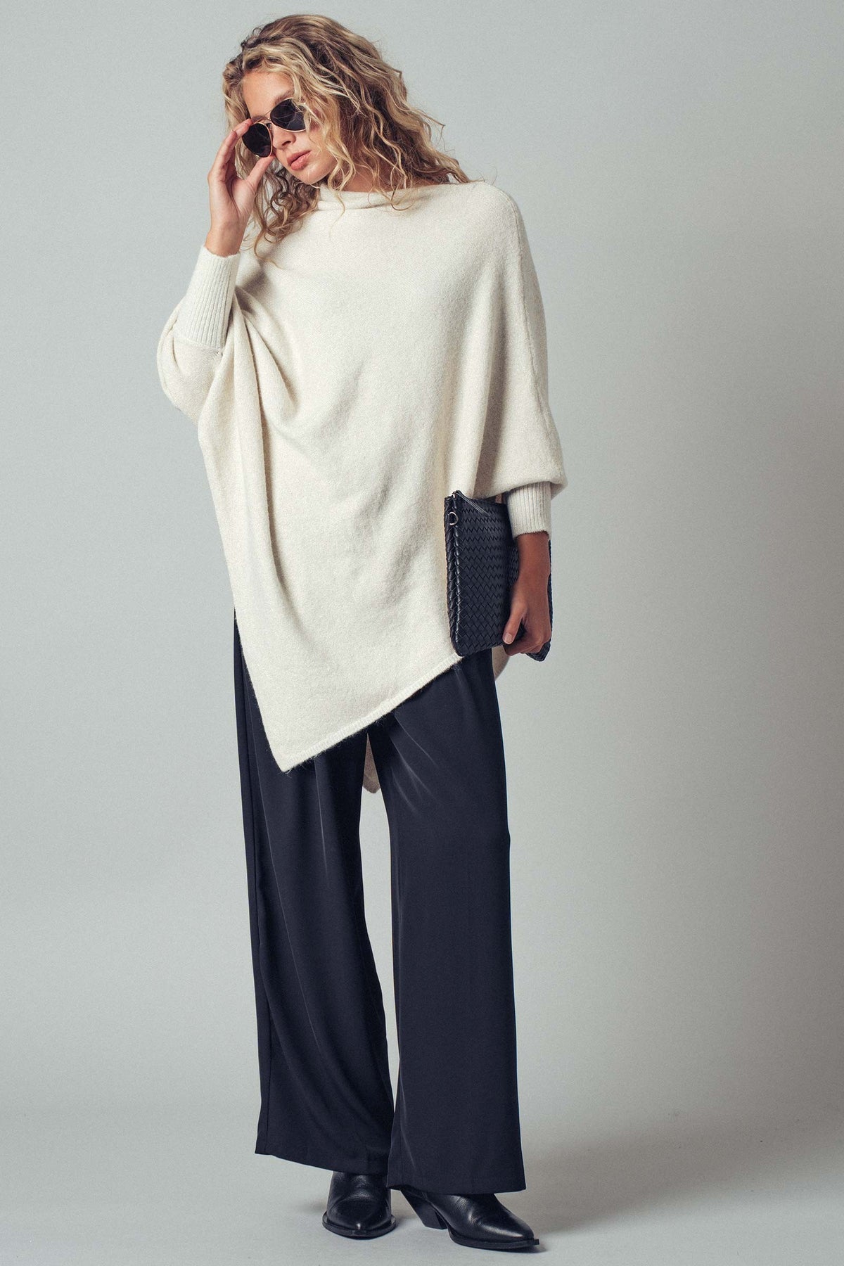 Asymmetrical Drape Knit Poncho Sweater in Ivory - Women's Capes & Ponchos | Urban Daizy