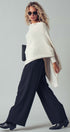 Asymmetrical Drape Knit Poncho Sweater in Ivory - Women's Capes & Ponchos | Urban Daizy