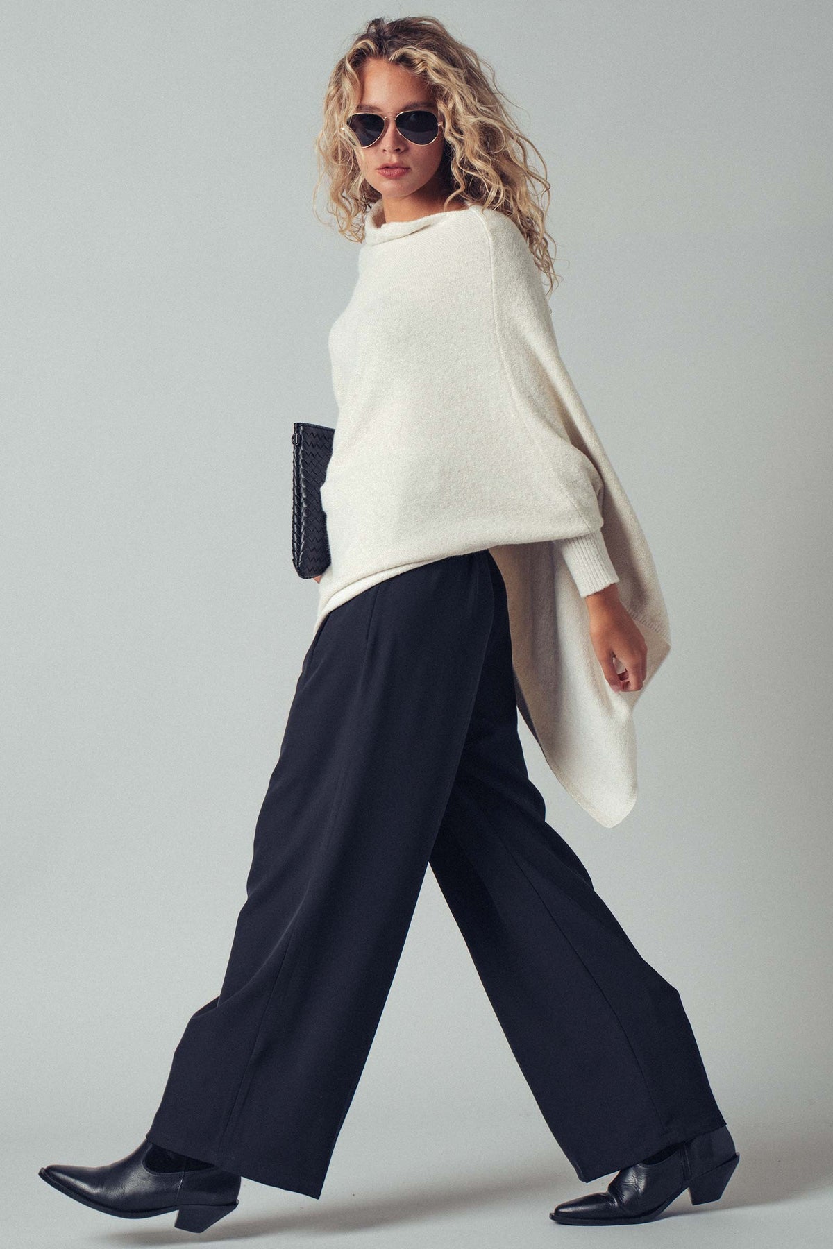 Asymmetrical Drape Knit Poncho Sweater in Ivory - Women's Capes & Ponchos | Urban Daizy