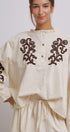 Embroidered Cotton Linen Blouse With Ruffle Collar in Linen - Women's Tops | Urban Daizy