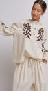 Embroidered Cotton Linen Blouse With Ruffle Collar in Linen - Women's Tops | Urban Daizy
