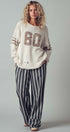 Wide Leg Striped Pants with Drawstring Tassel in Black - Women's Casual Pants | Urban Daizy