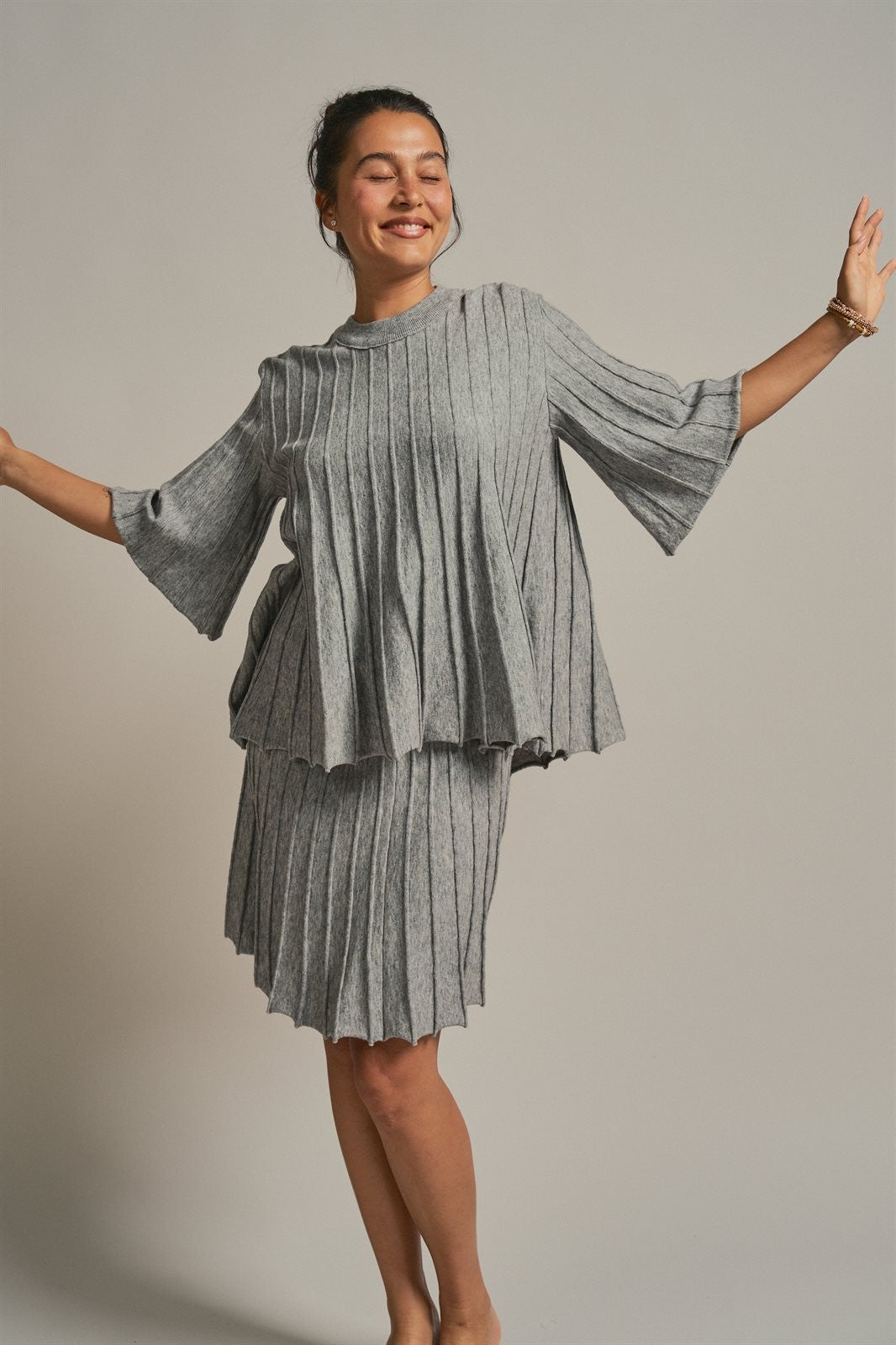 Pleated Swing Knit Top with Bell Sleeves in Grey - Women's Pants | Urban Daizy