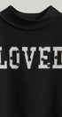 LOVED Varsity Patch Mock Neck Sweatshirt in Black - Women's Shorts | Urban Daizy