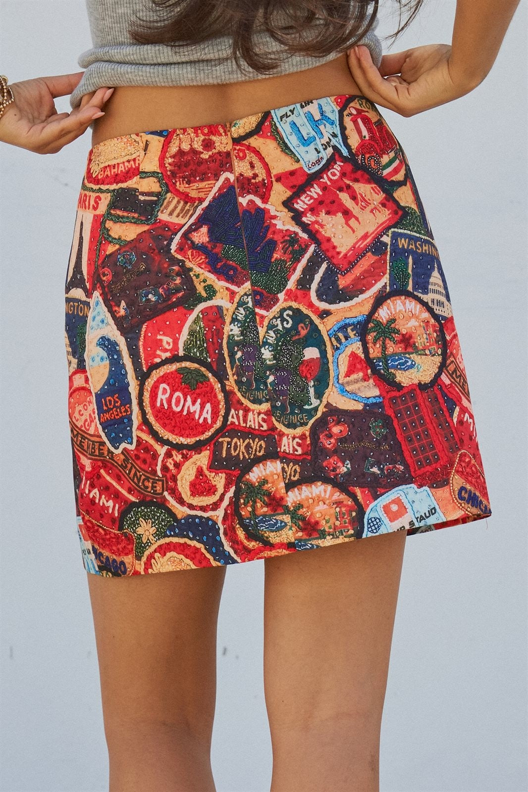 Travel Patch Print A-Line Mini Skirt in Multi - Women's Skirts | Urban Daizy