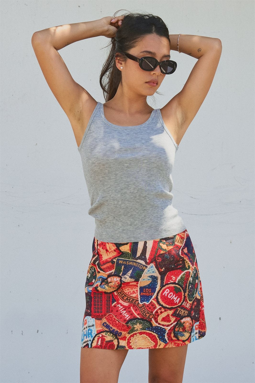 Travel Patch Print A-Line Mini Skirt in Multi - Women's Skirts | Urban Daizy