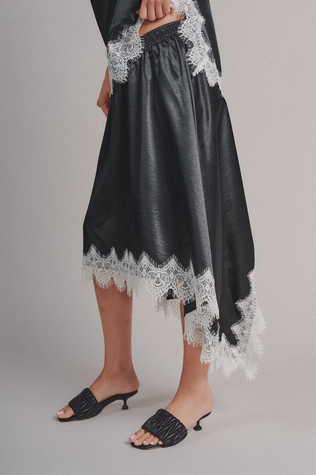 Lace Trim Satin Asymmetric Midi Skirt in Black - Women's Midi Skirts | Urban Daizy