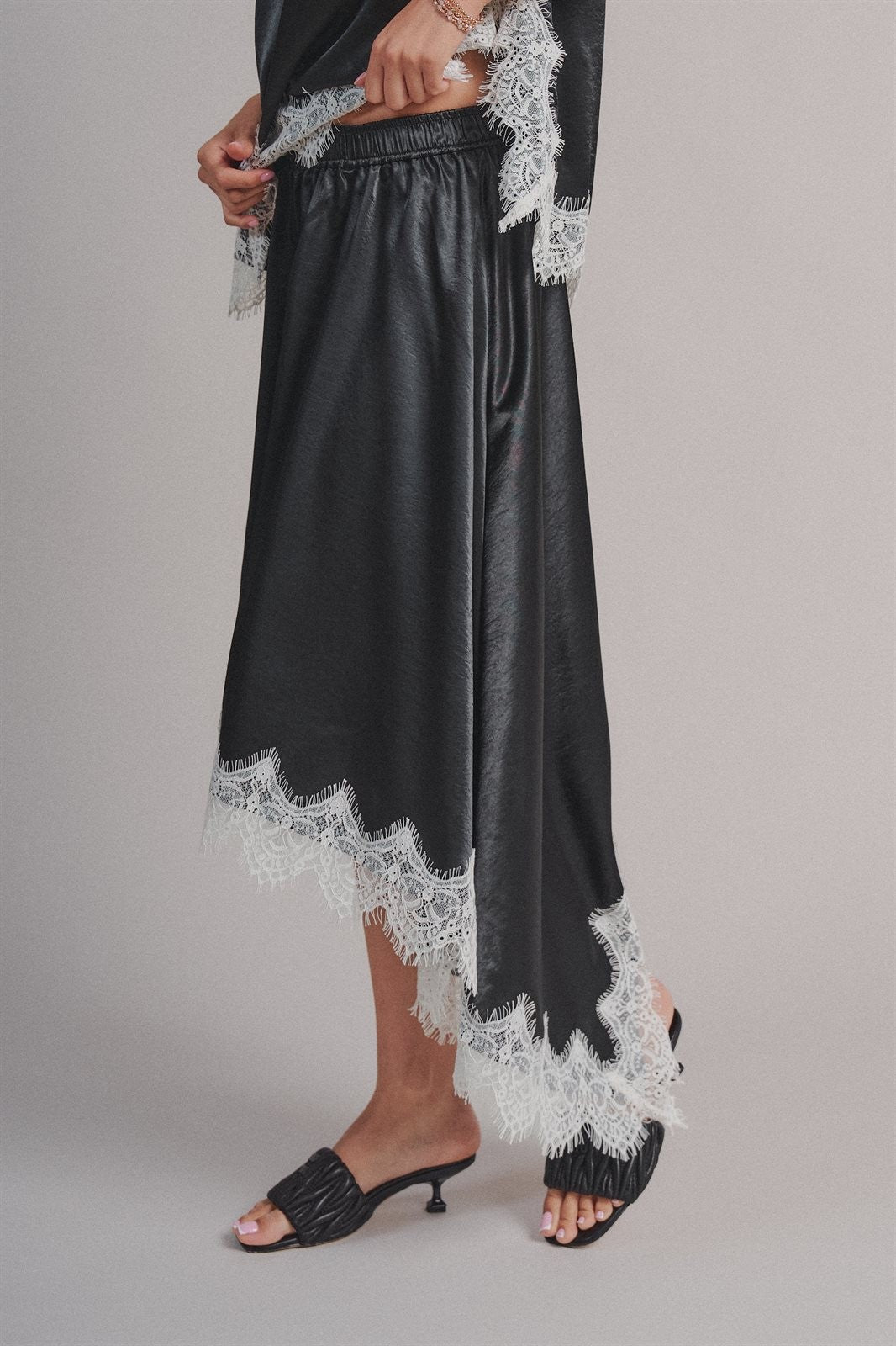 Lace Trim Satin Asymmetric Midi Skirt in Black - Women's Midi Skirts | Urban Daizy