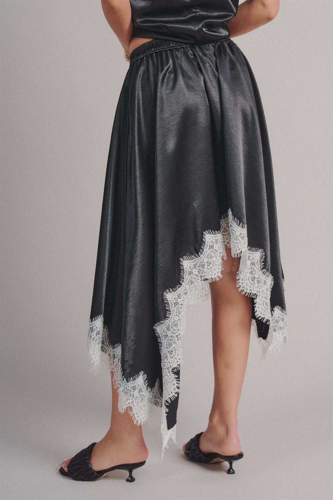 Lace Trim Satin Asymmetric Midi Skirt in Black - Women's Midi Skirts | Urban Daizy