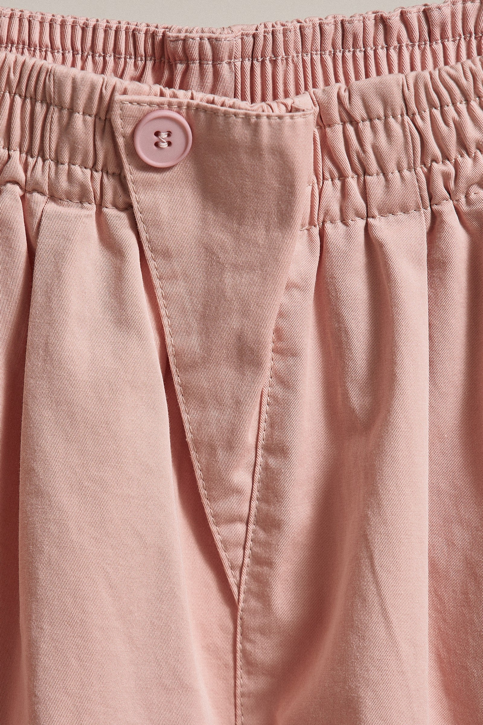 Cotton Twill Pleated Shorts with Button Front in Pink - Women's Fashion | Urban Daizy