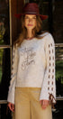Slogan Embroidered Knit Sweater with Lace-Up Sleeves in Oatmeal - Women's Sweaters | Urban Daizy