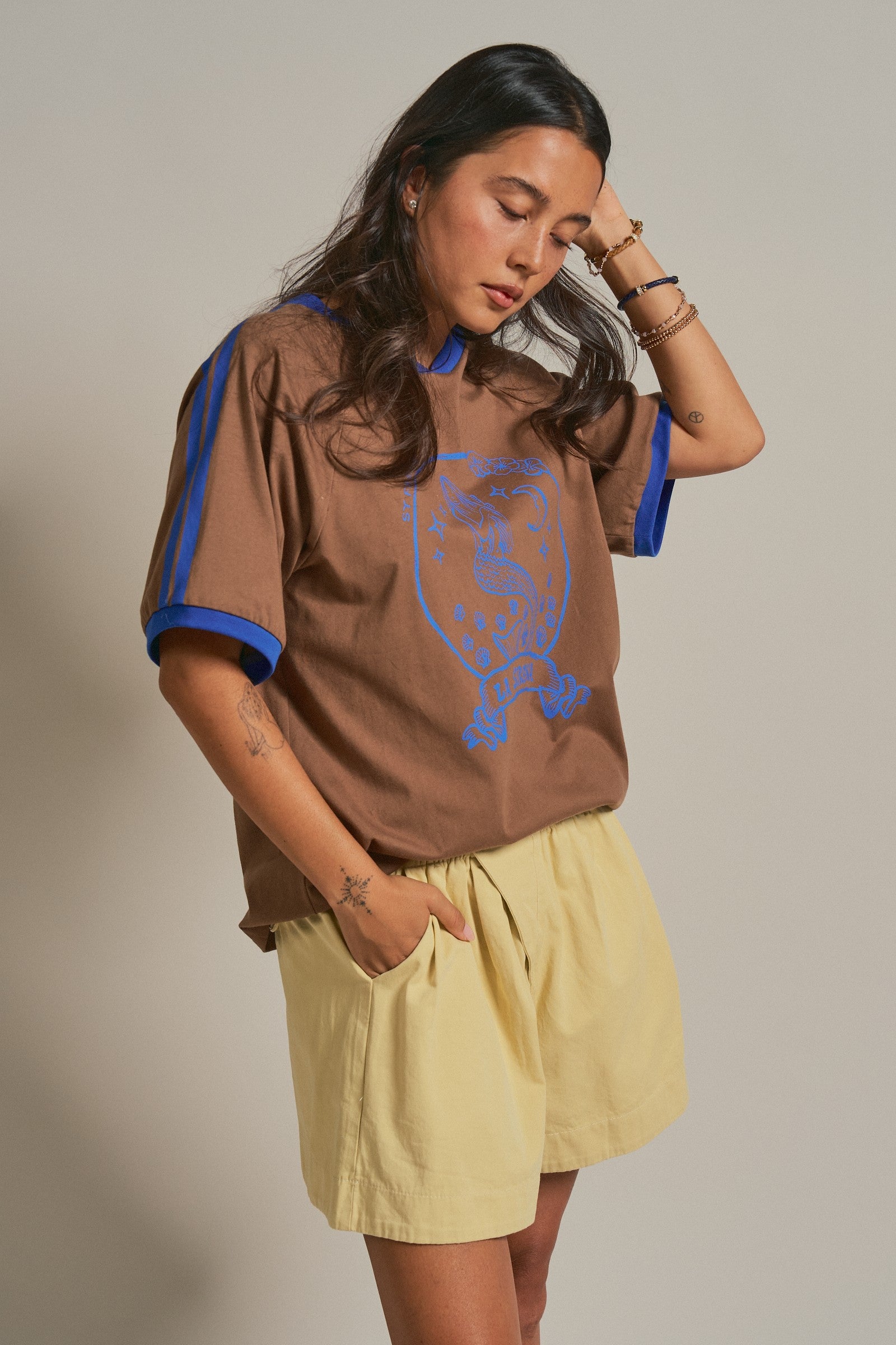 La Sirena Mermaid Graphic Ringer Tee in Brown - Women's Fashion | Urban Daizy