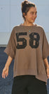 Vintage Varsity Oversized Graphic Tee in Brown - Women's Fashion | Urban Daizy