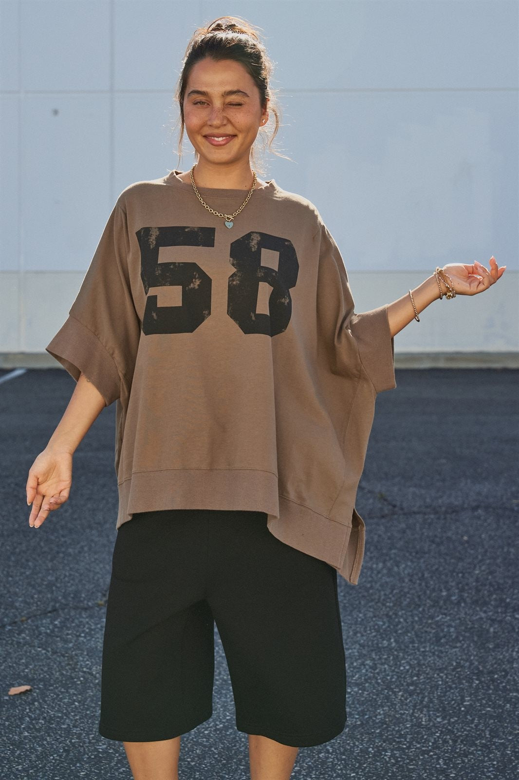 Vintage Varsity Oversized Graphic Tee in Brown - Women's Fashion | Urban Daizy